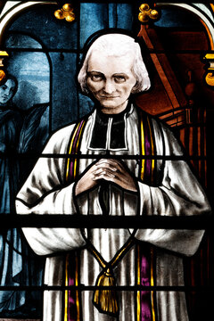 Saint Marien church.  Stained glass. Saint John Vianney, was a French Catholic priest who is venerated  as a saint and as the patron saint of parish priests. Mezilles. France.