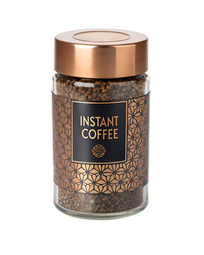 Glass jar of instant coffee granules with copper lid and geometric label on transparent background.