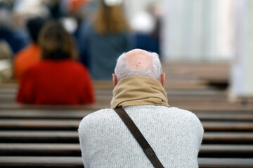 Mass in a roman catholic church. Parishioner praying. Saint Jean Baptiste church.   Megeve.France.