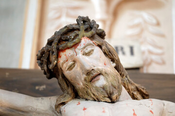 Saint Jean Baptiste church.   Jesus on the cross. The crucifixion. Megeve.France.