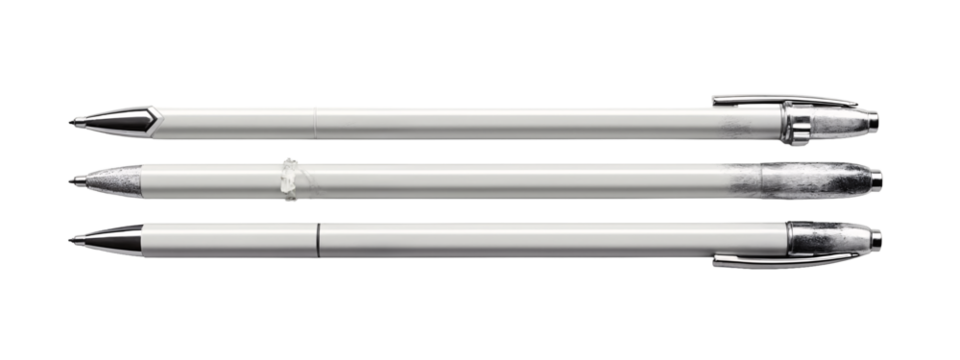A set of three silver pens sitting next to each other.