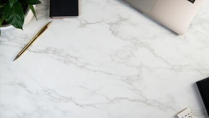 White marble desk flatlay minimalist workspace gold pen laptop notebook