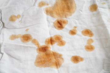Dirty tomato sauce stain removal or ketchup on cloth accident to wash with washing powder, cleaning housework.