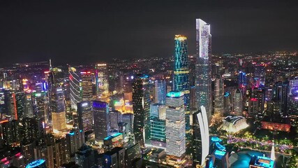 Skyscrapers light up the dark sky