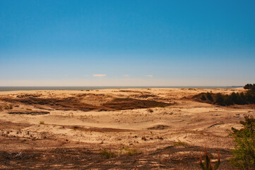 Beautiful scene of a sandy dunes and sea