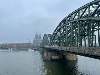 Naklejka premium The Cathedral and the bridge in Koln, Germany. November 28, 2022