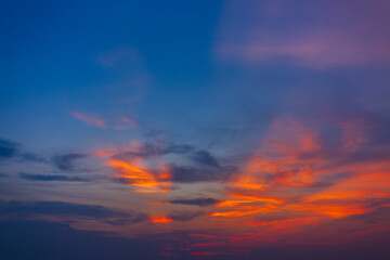 Colorful sky backdrop in the morning,Nature beautiful Light Sunset or sunrise sky,Sunset Sky Background in the Evening with Dramatic Dusk Clouds and Colorful Pink, Orange Sunlight on Blue Twilight sky