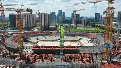 Guangzhou evergrande football stadium construction update in guangdong province, china - Powered by Adobe