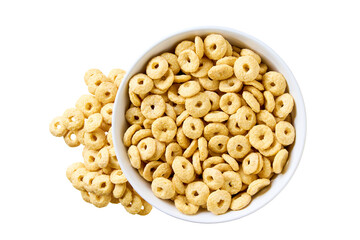 Whole grain cereal rings pouring out of ceramic bowl isolated on white background. Top view.