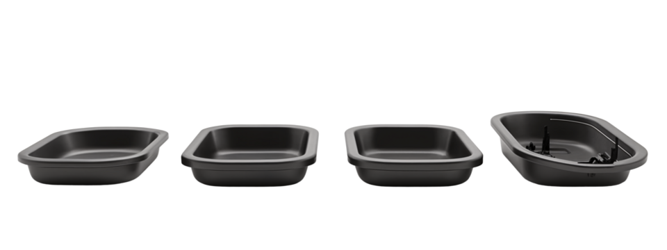 A set of four black plastic bowls