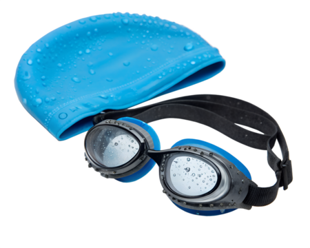Swimming gear including a blue silicone swim cap and a pair of blue swimming goggles with water droplets on a transparent background.