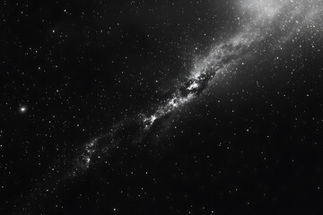 Fototapeta premium Black and white image of a dense star field and galactic cluster in deep space. A monochrome view of the cosmos that evokes timeless beauty, astronomy, mystery, and the vastness of the universe.