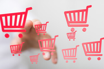 Hand interacting with digital shopping cart icons.  Perfect for e-commerce, online retail, and...