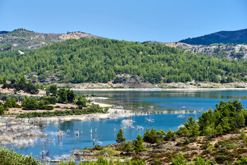mountain landscape and artificial reservoir on the Goudouras river on the island of Rhodes