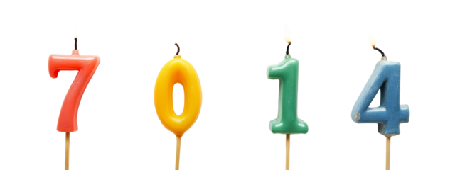 A row of colorful birthday candles with the number 7 on them.