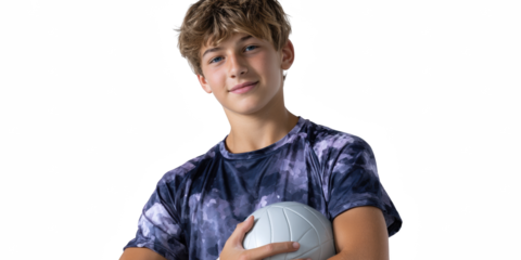 Young Volleyball Player's Portrait: A determined teenage athlete, holding a volleyball, radiates confidence and focus, epitomizing the spirit of the game.