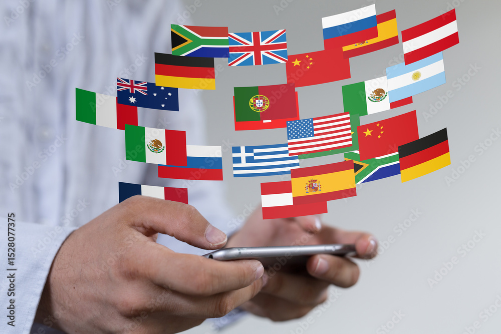 Poster Image of a person using a smartphone with various national flags appearing, symbolizing global communication and international business.