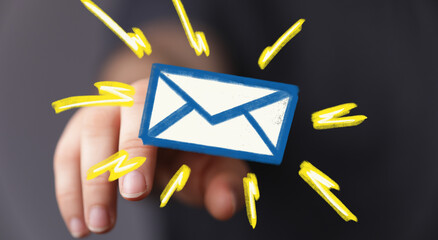 Image of a hand presenting a digital email icon, surrounded by yellow energy sparks. Perfect for...