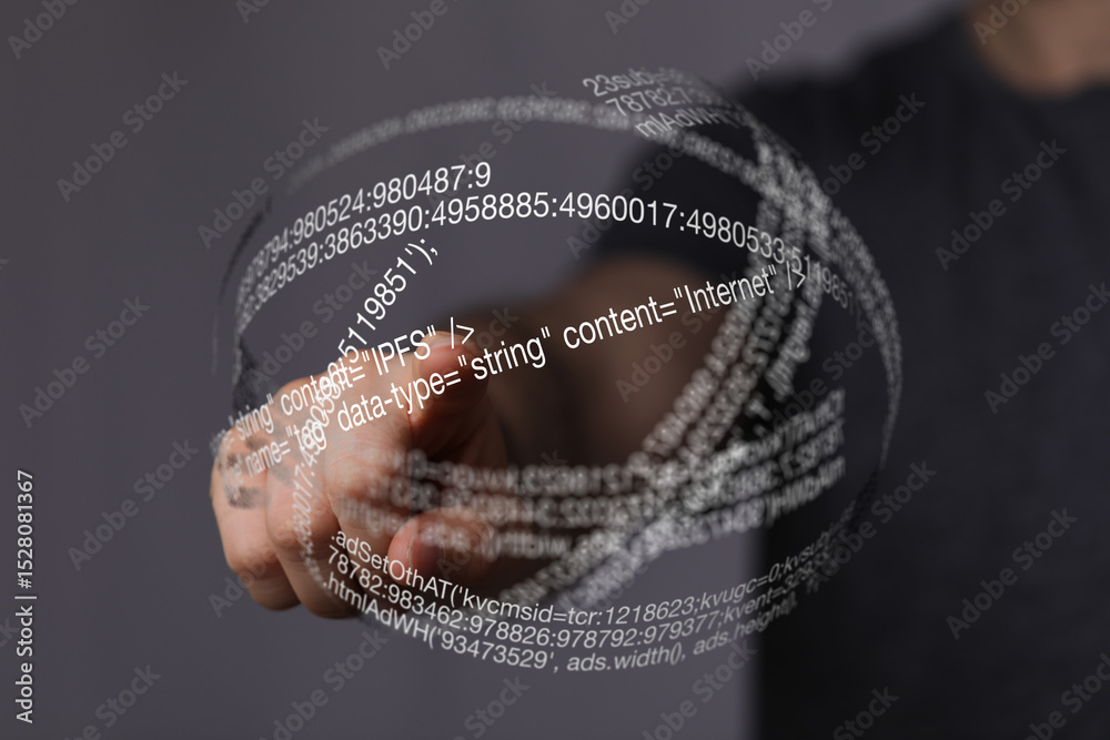 Aufkleber Close-up of a hand interacting with a translucent sphere filled with code.