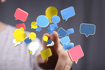 Network of colorful speech bubbles, representing online communication and social media.