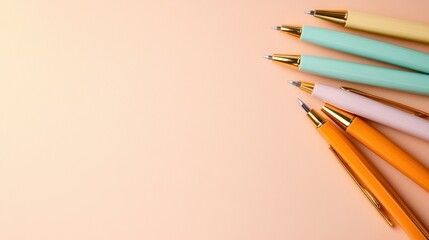 This vibrant image showcases an array of colorful pens arranged neatly against a soft background, highlighting creativity and the joy of writing or drawing.