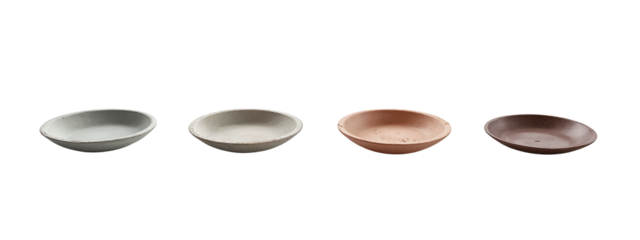 A set of four different colored bowls