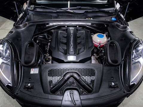 Novosibirsk, Russia -  April  04, 2024:  Porsche Macan,    Car engine close-up. Internal combustion engine, car parts, deteyling