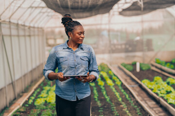 black female farmer  farm garden greenhouse vegetable