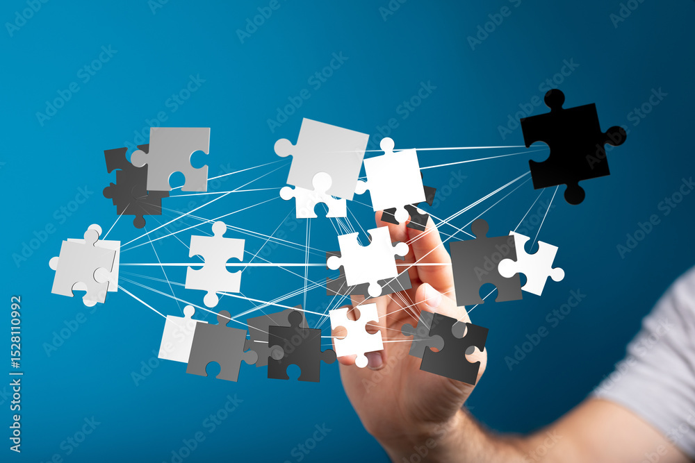 Poster Abstract image of interconnected puzzle pieces.  Represents teamwork, problem-solving, and strategic partnerships.