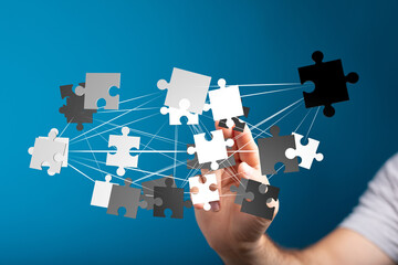 Plakat Abstract image of interconnected puzzle pieces. Represents teamwork, problem-solving, and strategic partnerships.
