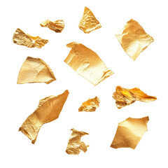 Fine pieces of gold leaf scattered on a white background for decoration and art projects