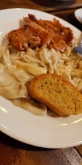 Carbonara Pasta with chicken cutlet and bread at Baguio City Philippines