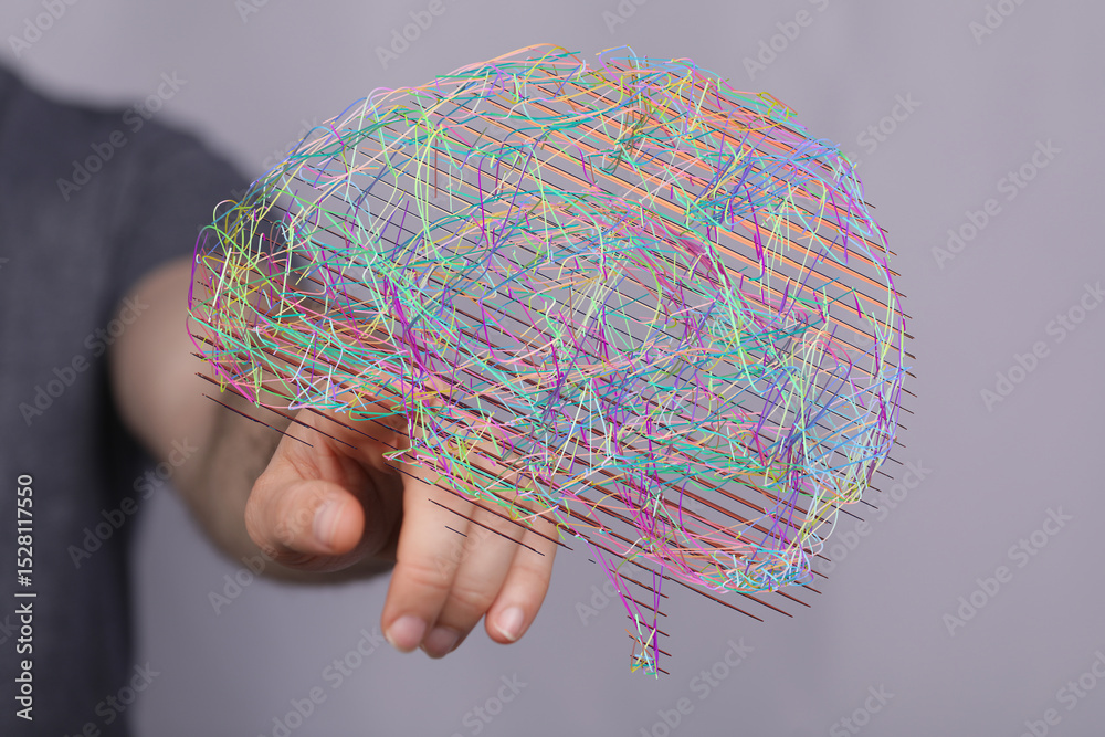Poster hand interacting with a colorful 3d brain model. represents neural network, ai, or mind.