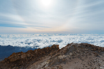 Sun halo above the clouds sea in Teide's summit