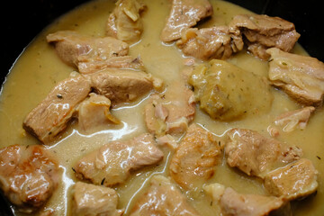 French regional dish. Veal blanquette with mushroom sauce.