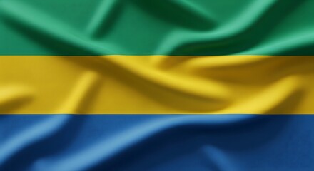 Fototapeta premium Close-up of the waving flag of Gabon, showing the colors and textures.
