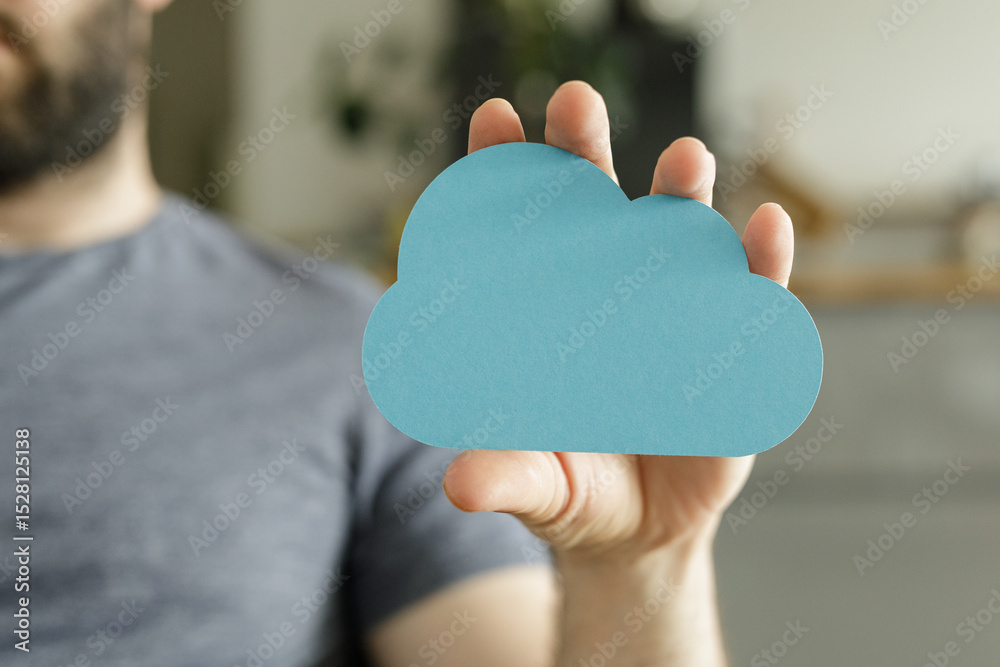 Aufkleber image of a person holding a paper cloud, symbolizing cloud computing, data storage, and digital tech