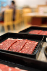 Close up of raw beef sliced meat meal for hot pot