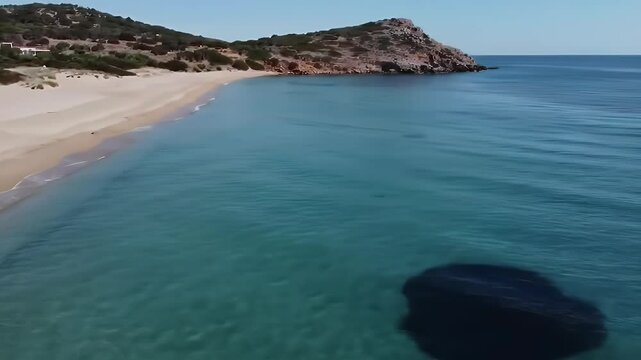 Aerial drone bird's eye view video of iconic beach of Potami or River with turquoise clear waters, South Evia island, Greece
