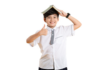 Portrait of Asian kid boy wearing school uniform and holding book posing on  png background	
