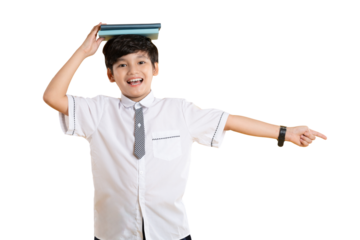 Portrait of Asian kid boy wearing school uniform and holding book posing on png background