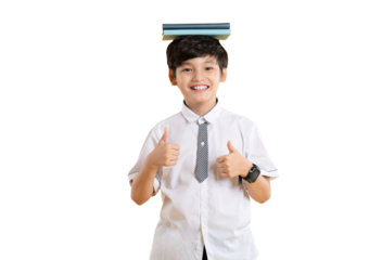 Portrait of Asian kid boy wearing school uniform and holding book posing on png background