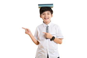 Portrait of Asian kid boy wearing school uniform and holding book posing on png background