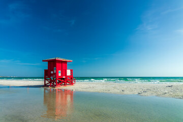 Red lifeguard station tower on Siesta Beach in Siesta Key, Sarasota, Florida