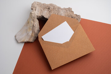 Paper envelopes on a light background. New mail, write a message. Send and receive mail. Postal delivery service. Empty envelope, empty space. Communication with people, paperwork. Envelope close-up

