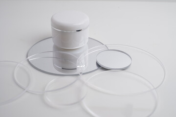 Container for cream, shampoo, toiletries, spa. Unbranded white plastic bottles. Bottle with a dispenser for cosmetic products. Skin care and beauty concept. Mockup style, copy space