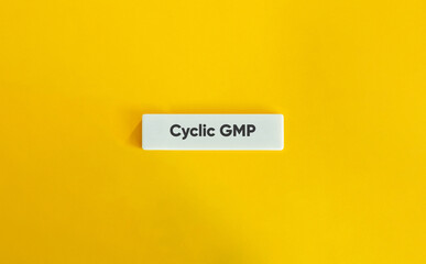 Cyclic GMP Letter Tile on Yellow Background with Minimal Aesthetic