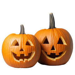 Two carved jack-o'-lanterns, Halloween pumpkins with friendly faces, sit side by side, exuding festive autumn spirit.