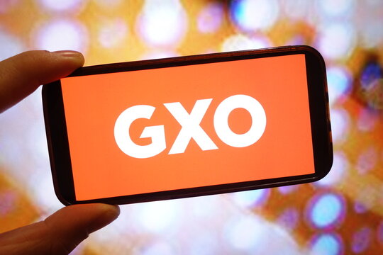 Konskie, Poland - February 26, 2025: GXO Logistics company logo displayed on mobile phone