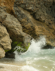 waves crashing on rocks